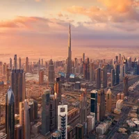 Aerial view of Dubai Downtown skyline at sunset with Burj Khalifa — best area to stay in Dubai for first-time visitors