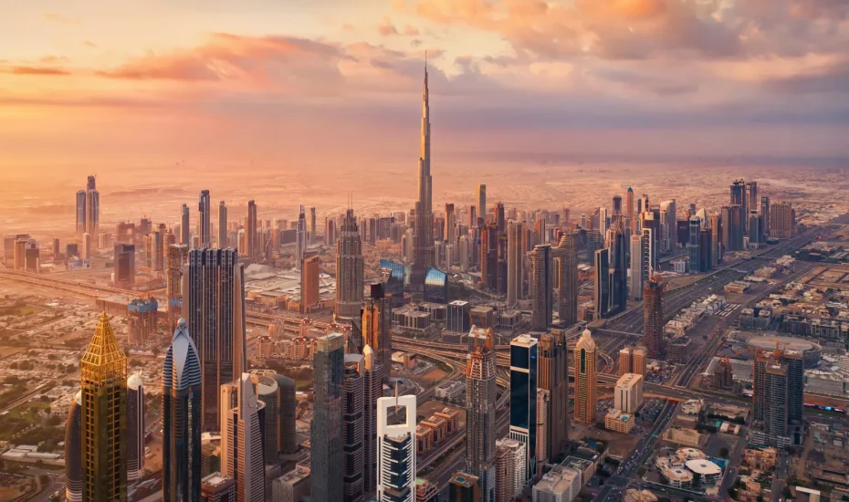 Aerial view of Dubai Downtown skyline at sunset with Burj Khalifa — best area to stay in Dubai for first-time visitors